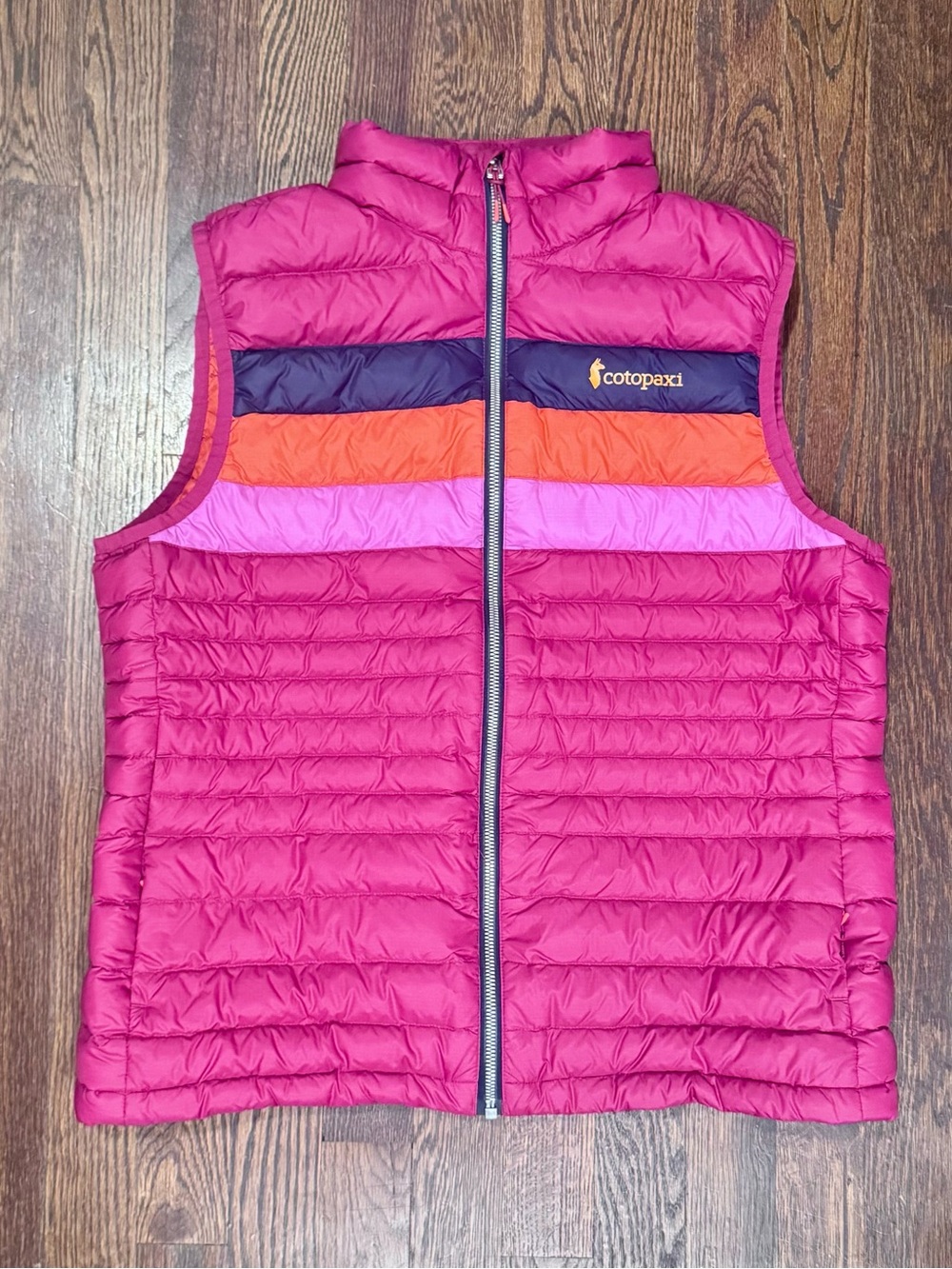 Cotopaxi Women’s Magenta Puffer Vest with Colorblock Stripes